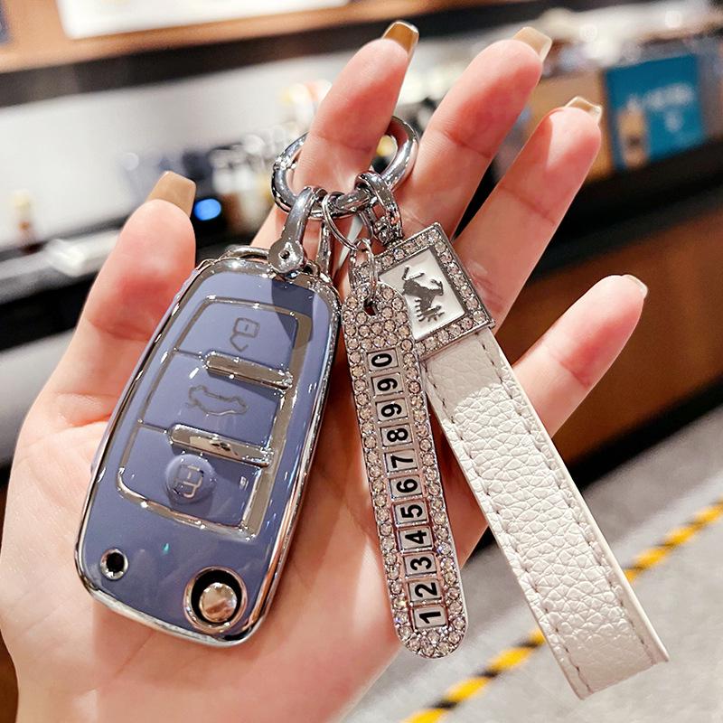 Chery Key Case for Tiggo 3x, Arrizo 5, and QQ Ice Cream - High-End Protective Shell with Buckle for Women.