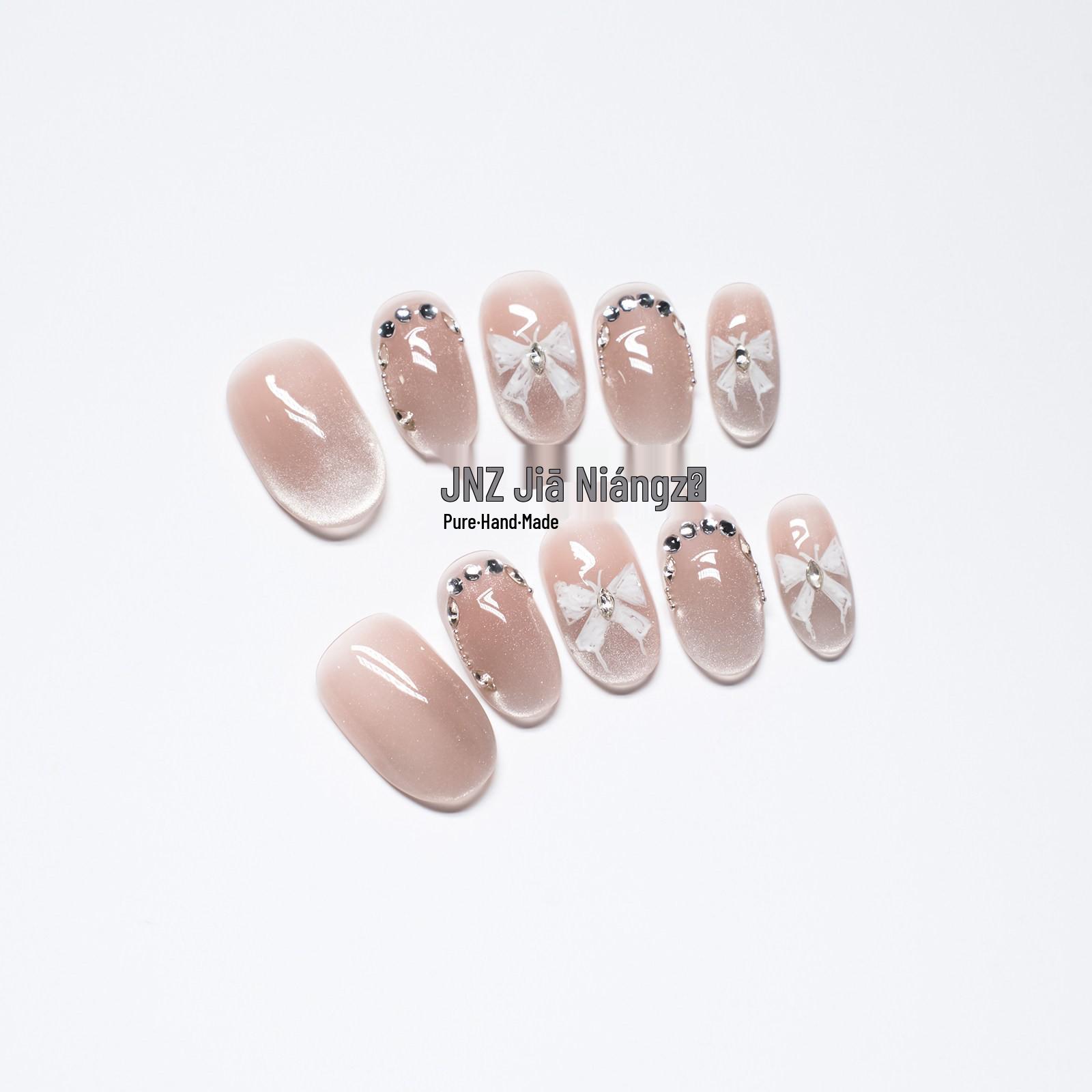 

Jia Niangzi Handmade Nude Pink Cat Eye Nails with Butterfly Design for Spring/Summer 10 Pieces XS (Includes Tool Kit)