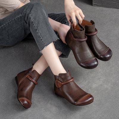 Otoño e invierno nuevo cuero vacuno de primera capa retro botas de mujer cremallera lateral suela plana punta redonda zapatos de mujer simples versátiles
