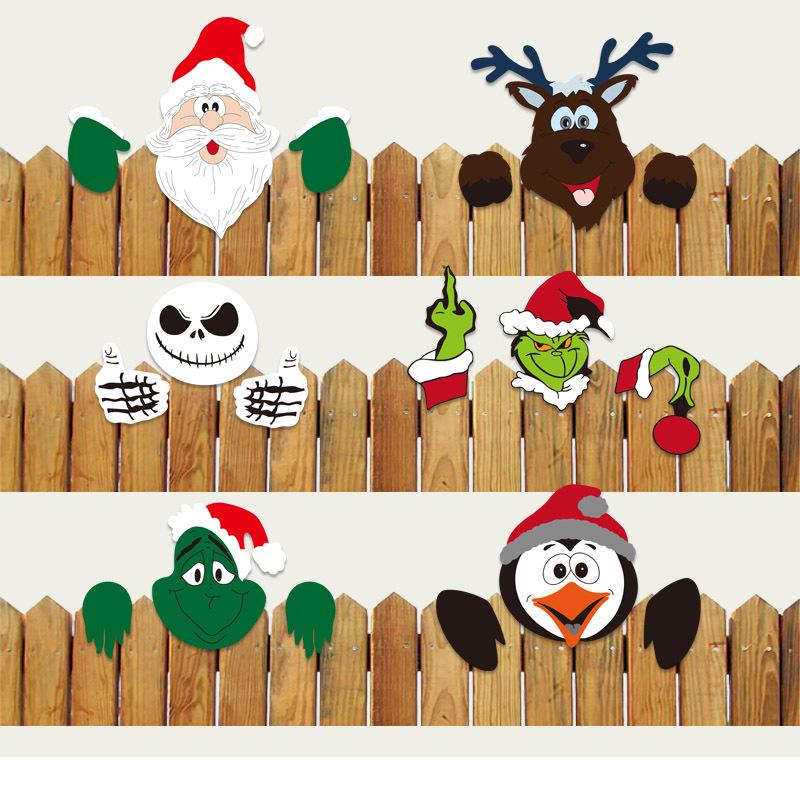 Grenzüberschreitende Weihnachtsdekoration mit Rentieren und Weihnachtsmann, Elch lugt aus dem Zaun