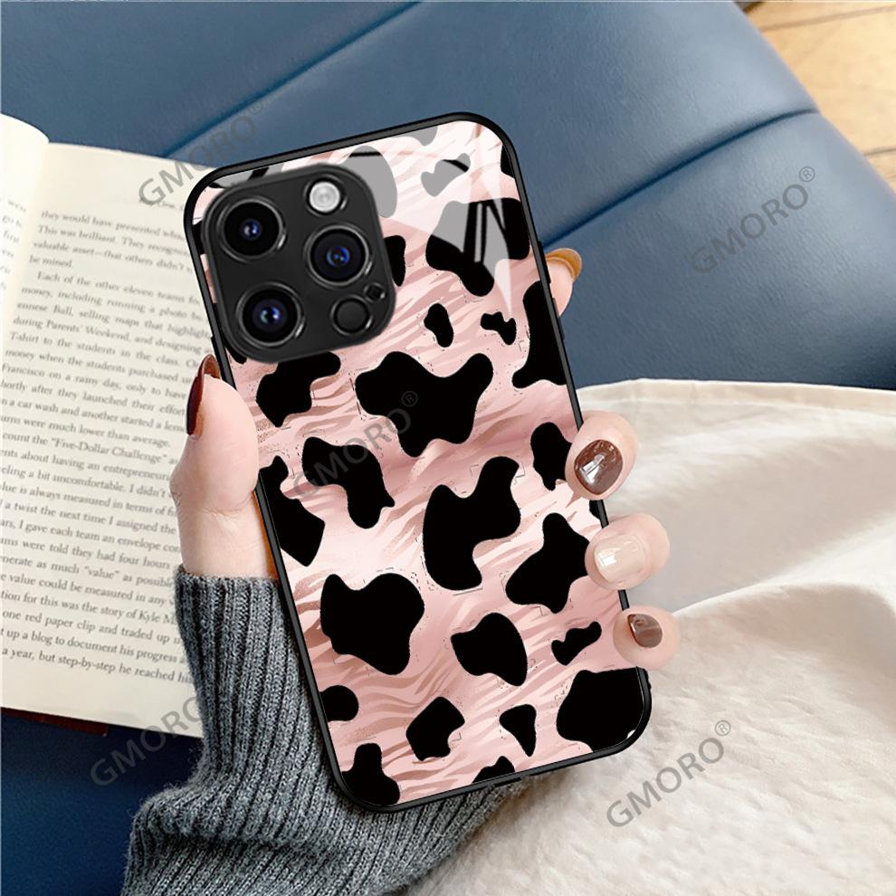 Hot-selling black cow pattern is suitable for iPhone17 light luxury glass protective case, Apple 16 Korean mobile phone case.