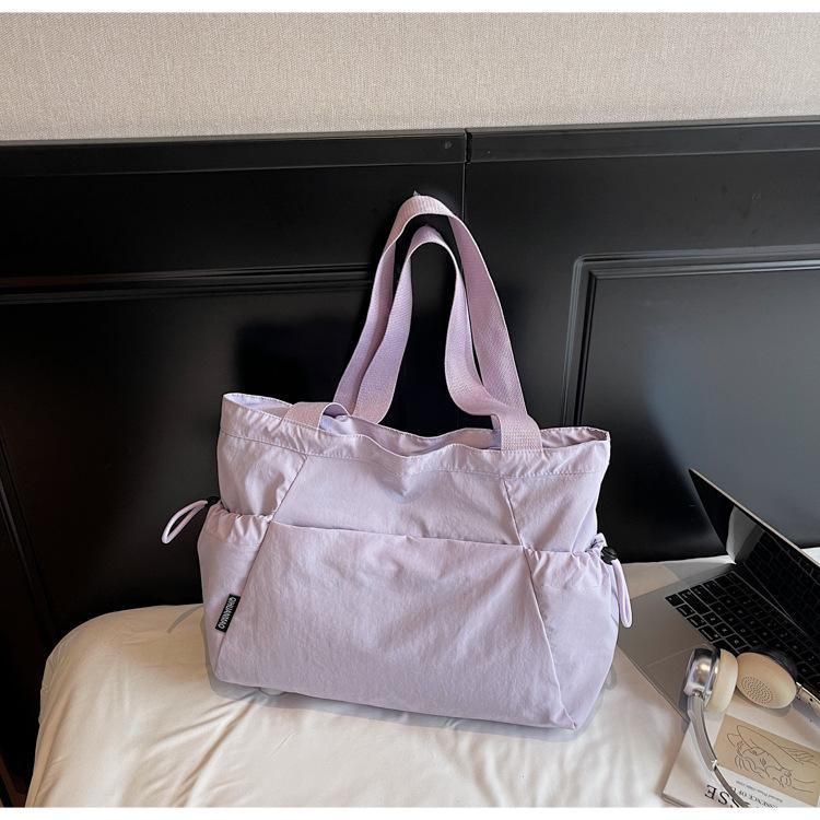

Fashion pleated casual versatile underarm canvas bag women s 2025 new Korean version large-capacity shoulder shopping bag bag фіолетовий