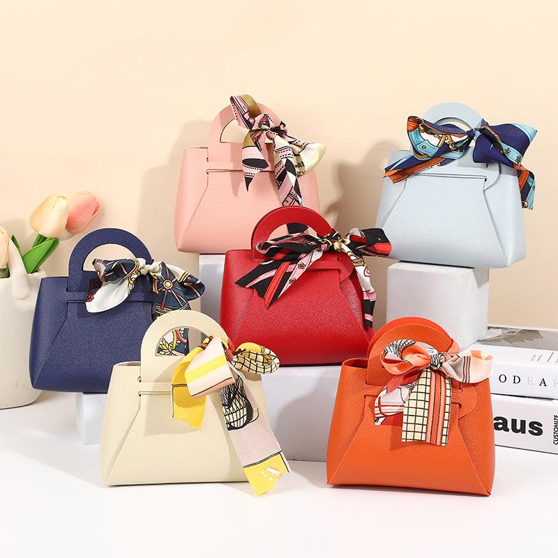 Europäische Handtasche aus PU-Leder im leichten Luxus-Stil & Süßigkeiten-Geschenkbox