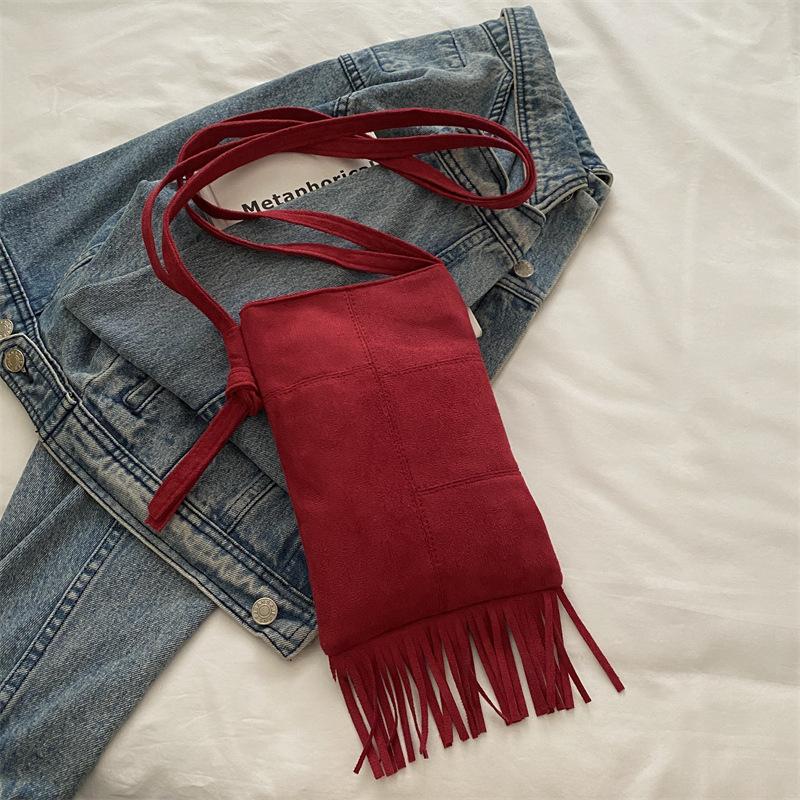 2025 new suede niche design new women's bag bohemian American fringed bag matte messenger