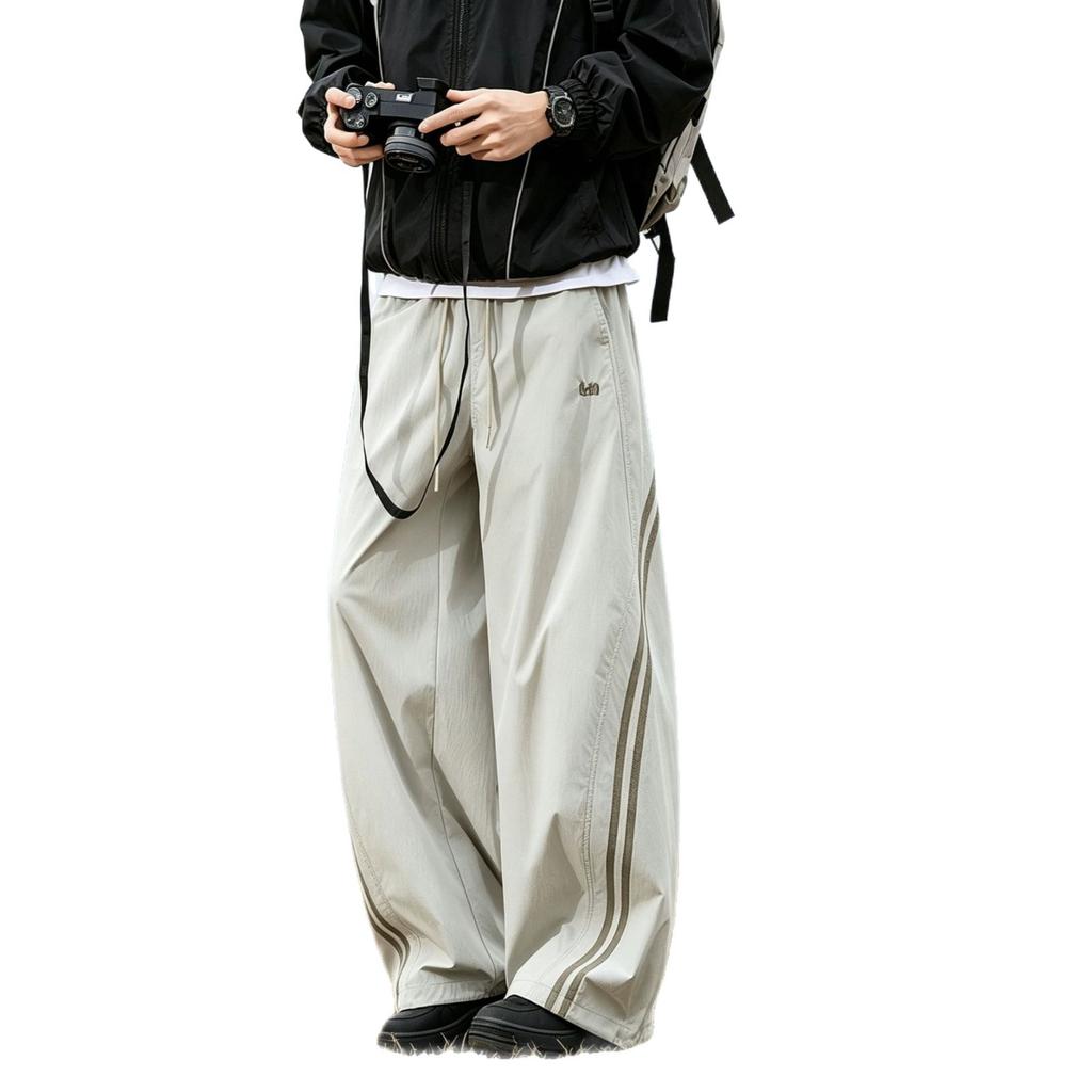 Spring and summer new European scimitar striped loose khaki wide-leg casual pants men's very light pants