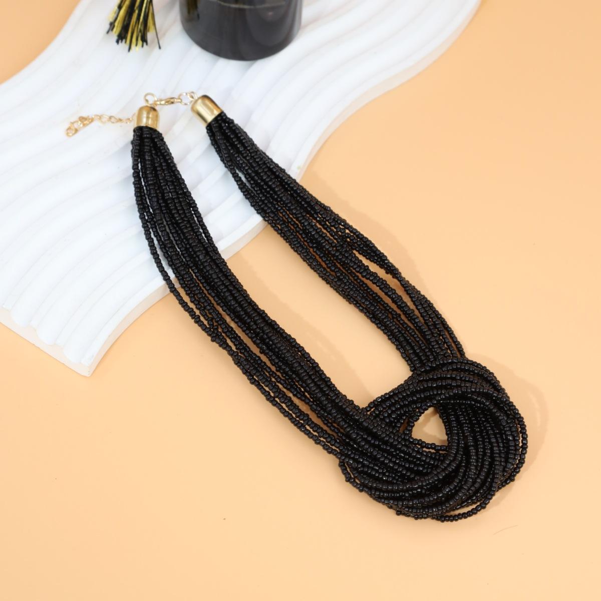 

Богемний етнічний стиль багатошарове кольорове намисто з рисових намистин