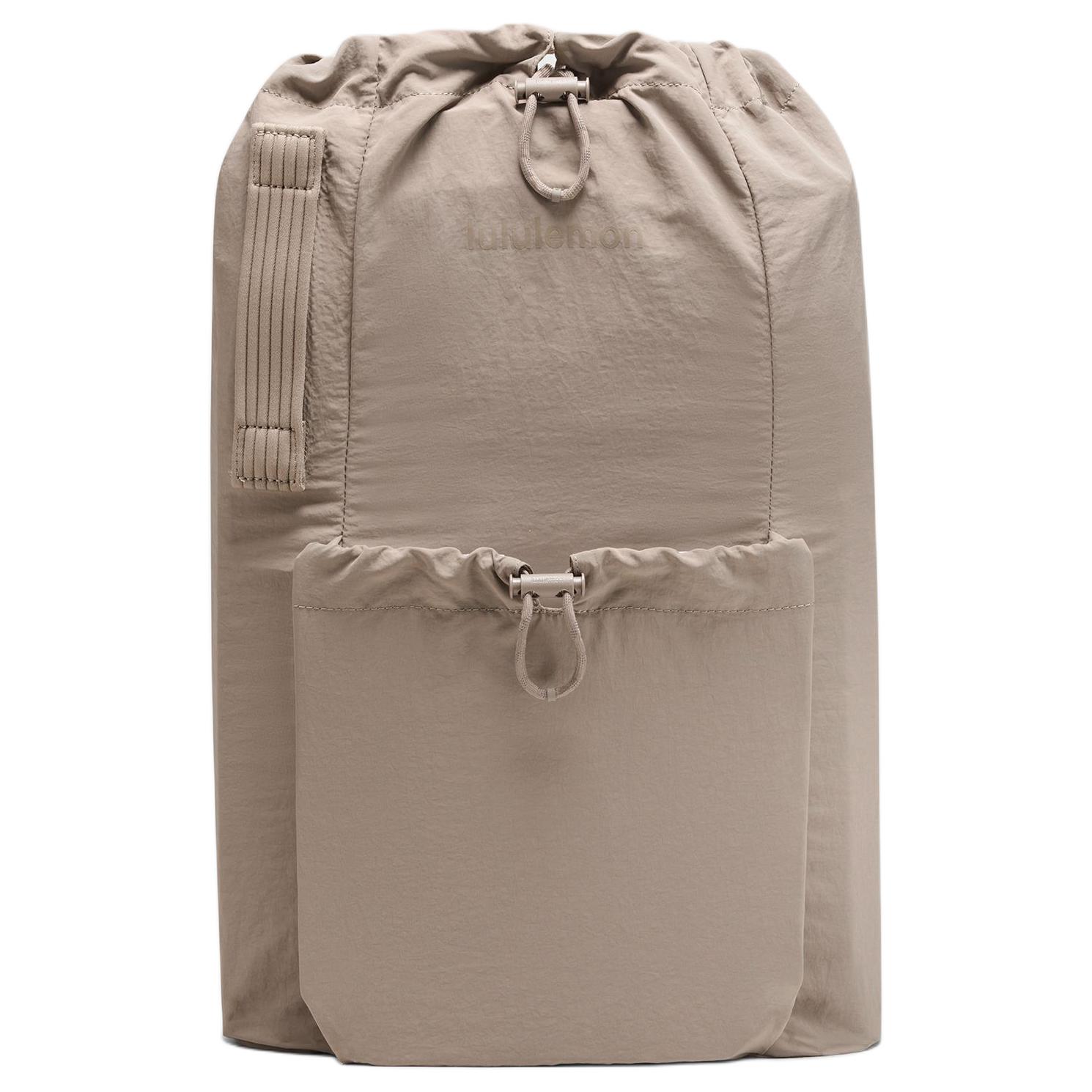 

Lululemon Convertible Series 21L Minimalist Versatile Recycled Nylon Backpack Unisex backpack Warm-Gray Light-Ivory LU9CGBS-070403 Warm Gray with Light Ivory