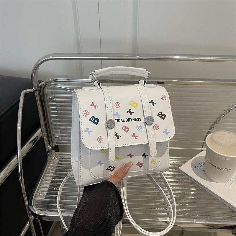 

Простой зарубежный стиль колледж стиль текстурная печать 2025 весна новый для работы на плечо кроссбоди рюкзак сумка женская