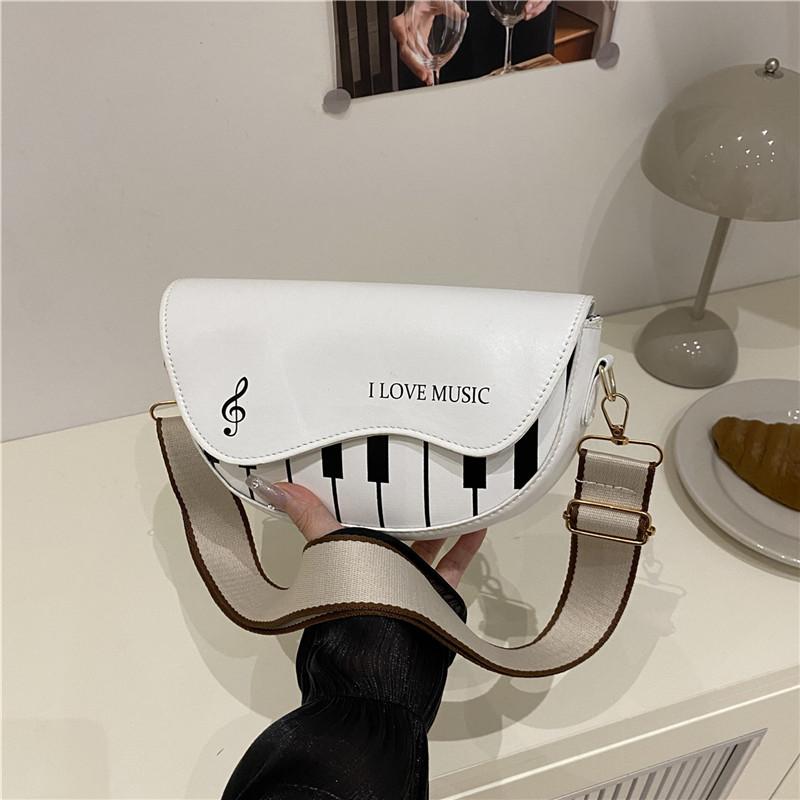New piano keys trendy shoulder bag casual versatile temperament saddle bag niche design messenger bag