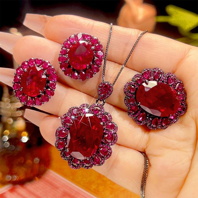 Autumn and winter new huabi jewelry simulation red corundum retro black gold jewelry set main stone 13 * 18-10-12