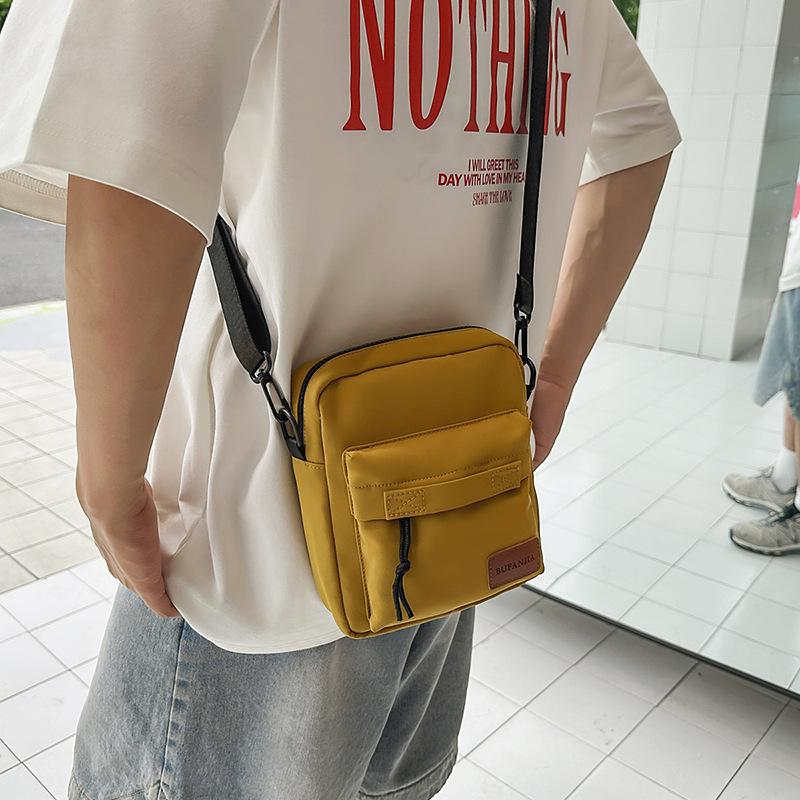 Summer senior commuting mobile phone crossbody small bag women's new simple canvas couple small square bag