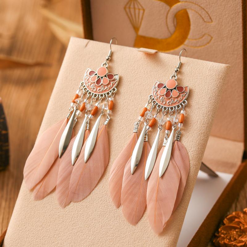 Neuer Drop Oil Fächerförmiger Federohrring für Damen Mode Bohemian Langer Silberfarbener Metall Reiskorn Hänger Ohrring Schmuck