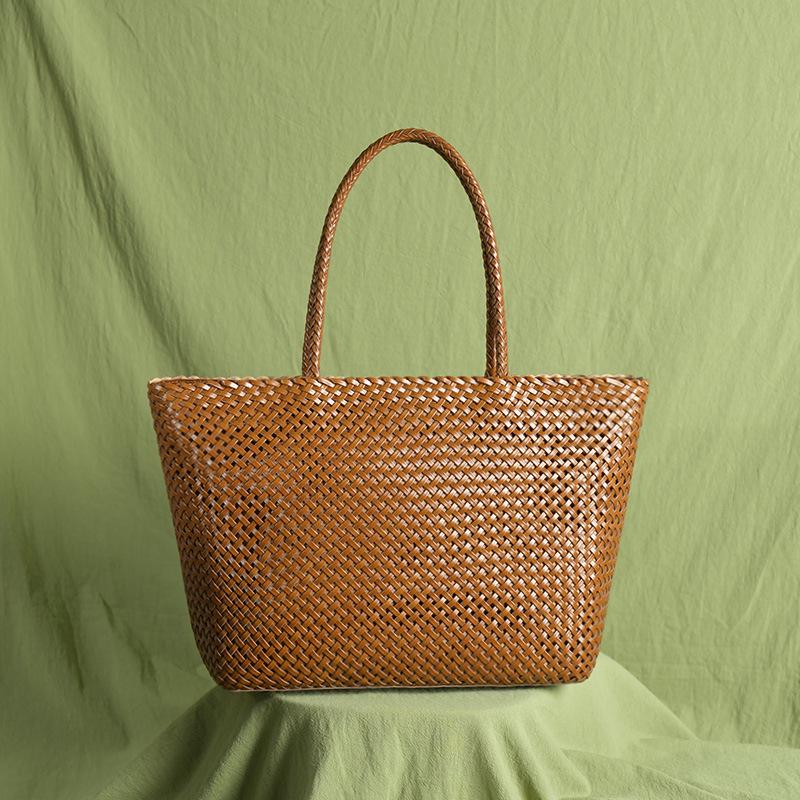 

Ladies Genuine Leather Cutout Woven Shoulder Handbag