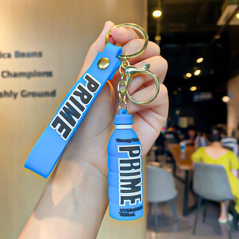 

Брелок для ключей в виде милой бутылочки Prime Drink, силиконовый аксессуар, идеально подходит для подарков и сувениров синий