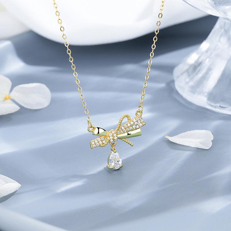 

Ожерелье с каплями воды и бантом для женщин, легкая роскошь, высокое качество, элегантность, универсальная цепочка на ключицу