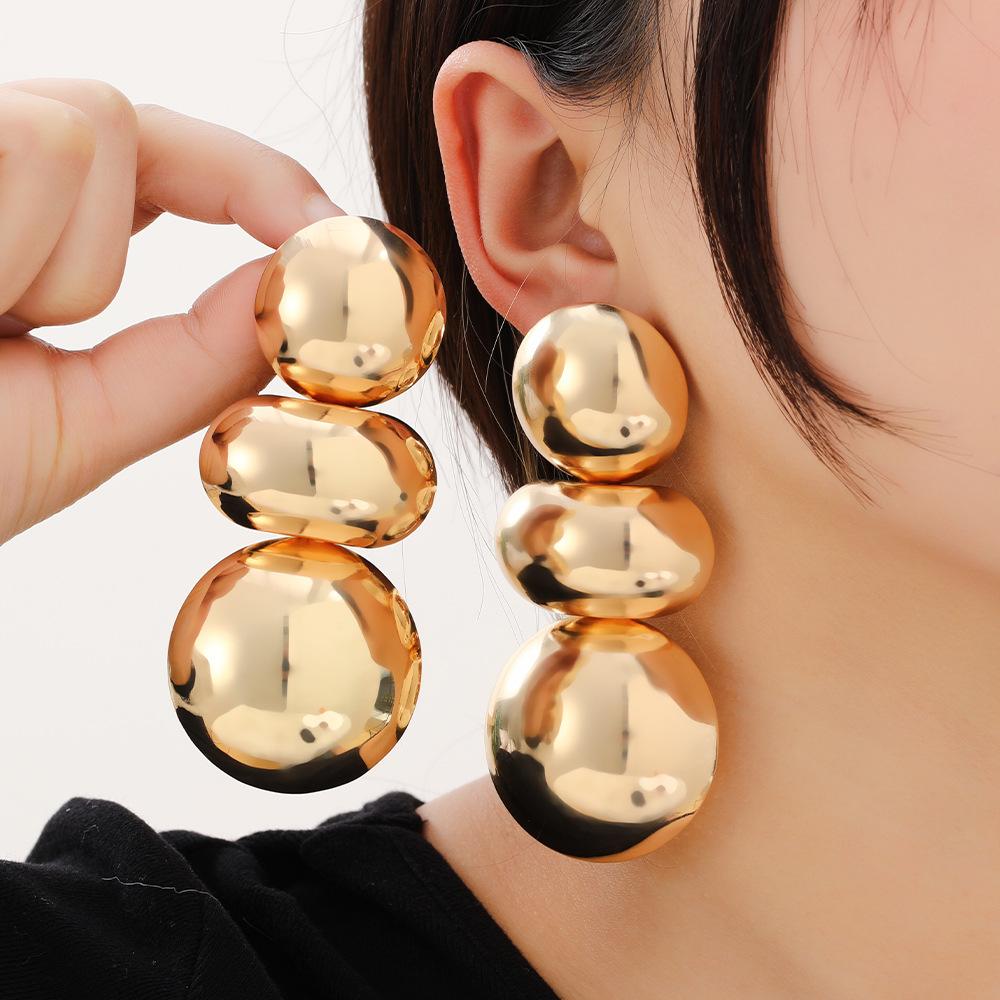 

Atmospheric glossy geometric round earrings золотий