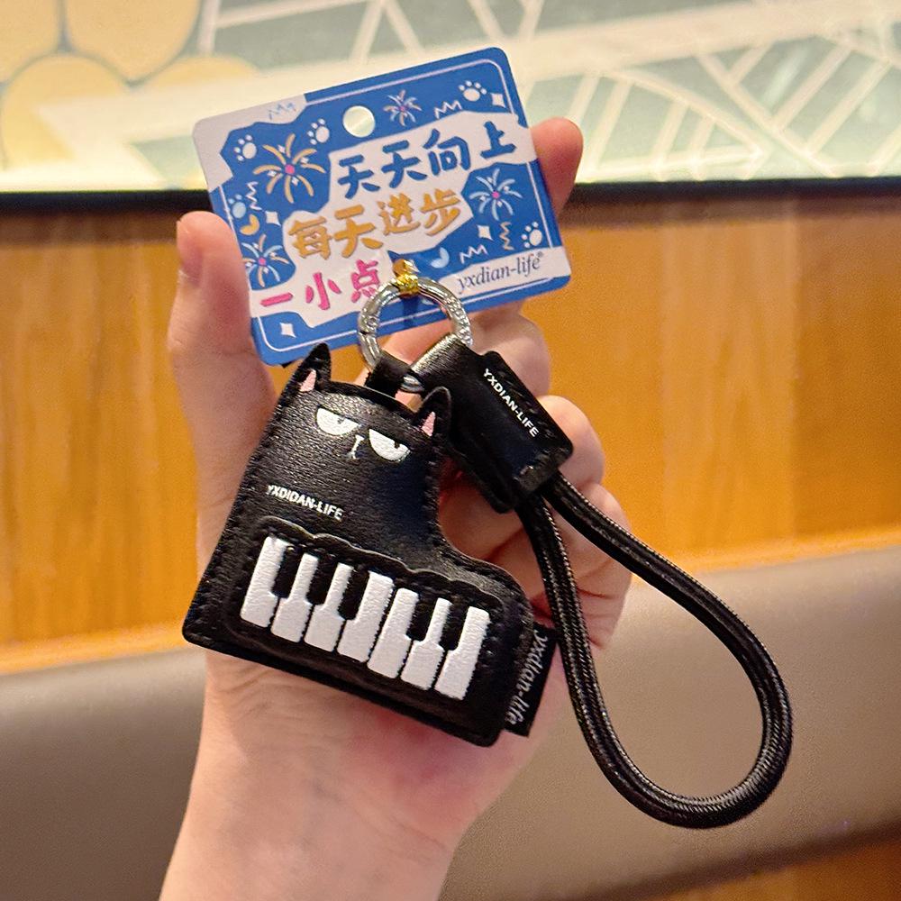 Genuine Piano Cat Leather Keychain: Cute Backpack Pendant, Musical Instrument Series, Customizable Small Gift for Students PVC Bag Packaging
