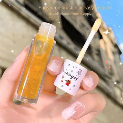 Aceite de labios con miel Hidratante y reparador Aclara las líneas de los labios Brillo de labios Bálsamo labial anti-grietas Lápiz labial resistente al agua Maquillaje de larga duración