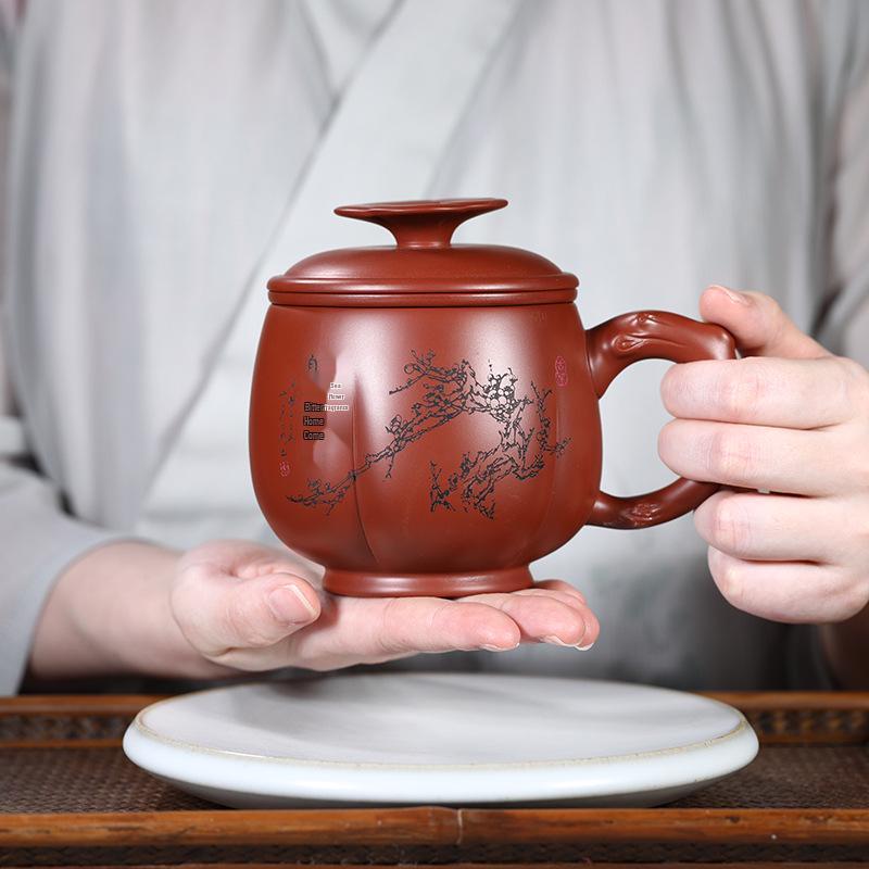 

Исинский чайный набор из трех предметов из пурпурной глины Чжу Ни с внутренним фильтром