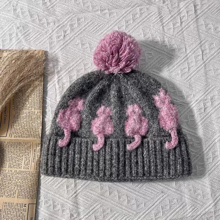 Cute three-dimensional cat jacquard wool hat female winter warm cold ear protection windproof color matching hairball knitted cold hat