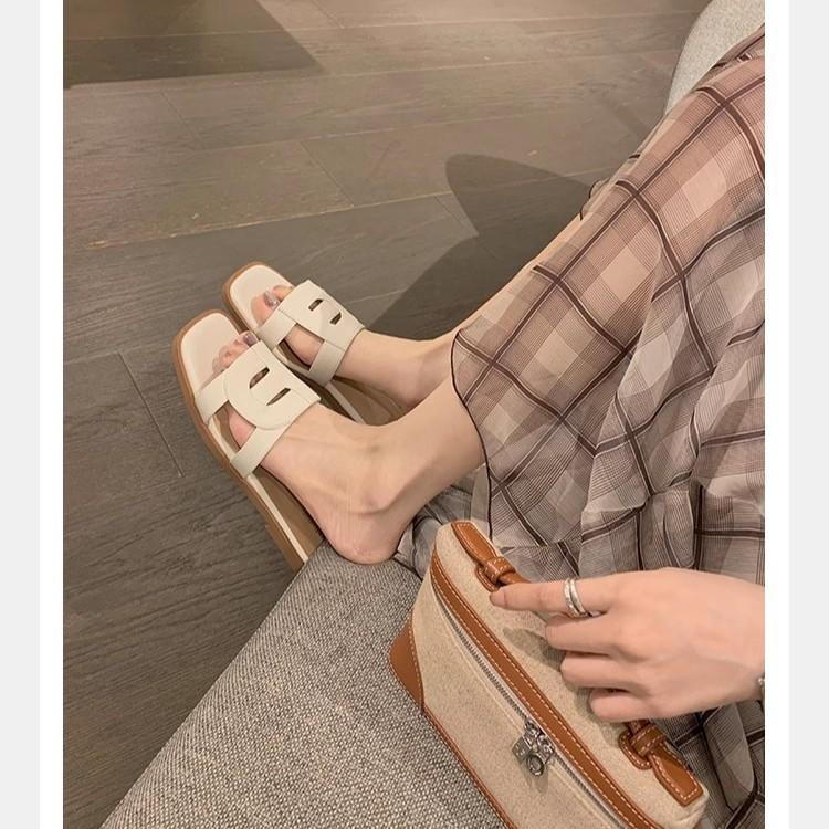 hollowed out and thin square head soft bottom versatile flat bottom one word beach wear leather slippers female summer