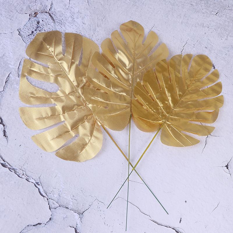 12 stk gull Kunstige falske palmeblader grønne planter Hjem bryllup DIY dekorasjon