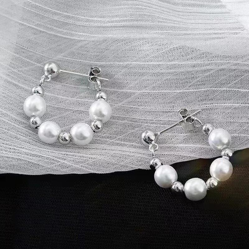 

Корейская мода Серьги из стерлингового серебра 925 пробы с жемчугом и универсальными ушными крючками – Легкая роскошь и стильный дизайн для женщин 925 Silver