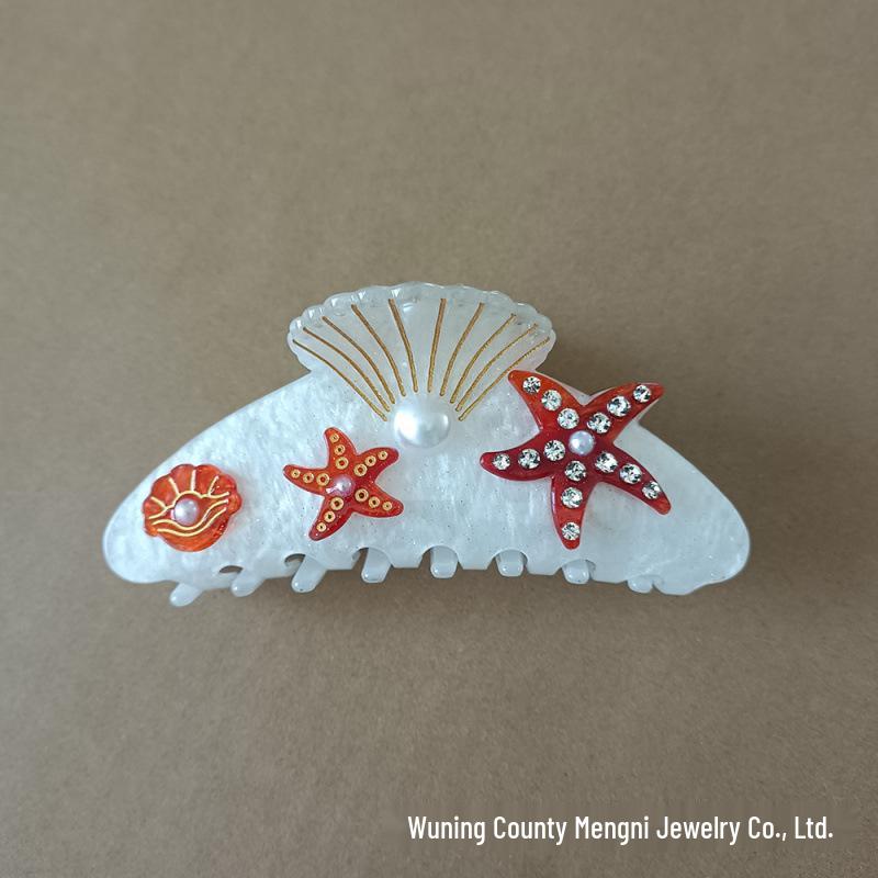 Elegancka spinka do włosów z cyrkoniami w kształcie rozgwiazdy i muszelkowa klamra do upięć