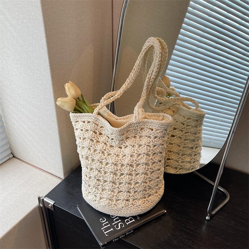 

Large capacity hollow bag women s summer new casual shoulder woven bag seaside vacation beach bag