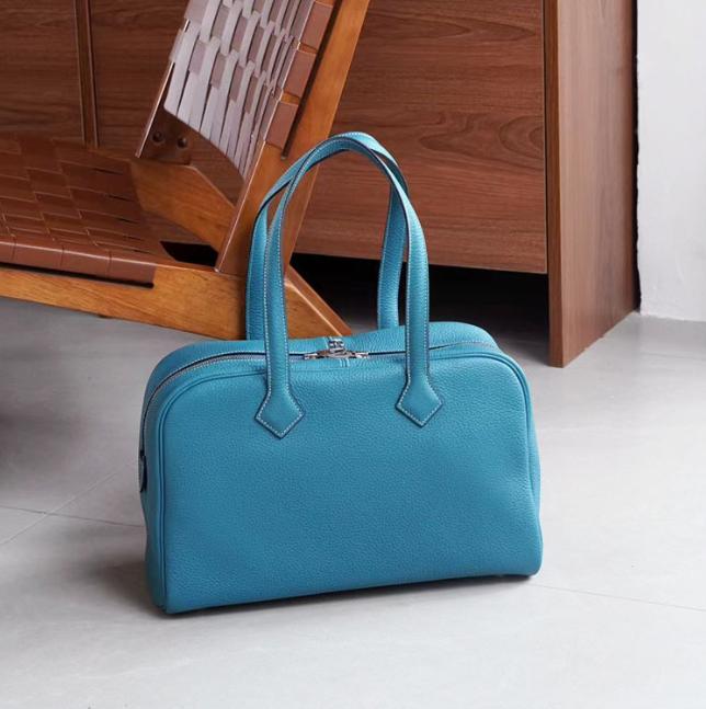 

High End Half Hand Sewn Steel Hardware Victoria 35 Head Layer TC Cowhide Hand-held Single Shoulder Commuting Versatile Women s Bag 35x22x15cm синій