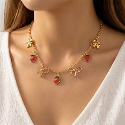 Y2K Sweet Strawberry Bowknot Pendant Necklace for Women Bohemian Metal Gold Plated Chain Necklace Fashion Jewelry Vacation Gift