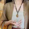 Retro Chinese Tassel Necklace: Unique Ethnic Style Women's High-End Clavicle Chain.