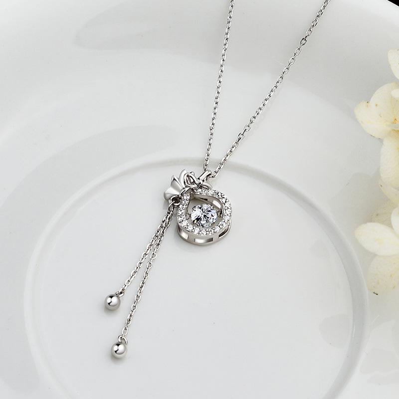 Sac porte-bonheur, Collier à pampilles, Tempérament féminin exquis, Petit groupe, Diamants légers et luxueux, Sac d'argent de haute qualité, Chaîne de col