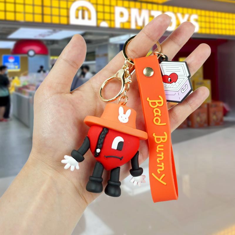 

Badbunny Cartoon Playful Keychain With Red Heart Pvc Rubber Key Holder Style F