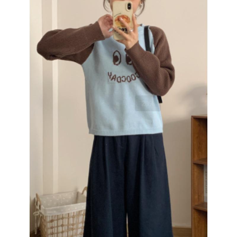 

Осень и зима новый контрастный цвет круглый вырез короткий свитер жаккард большие глаза смайлик сращивание длинный рукав вязаный свитер женский one size fits all синий