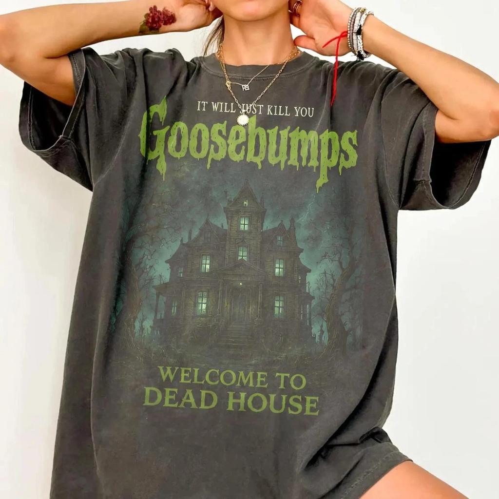 vintage "Goosebumps" haunted house graphic tee a Halloween horror experience. A short-sleeved, unisex tee for any season.
