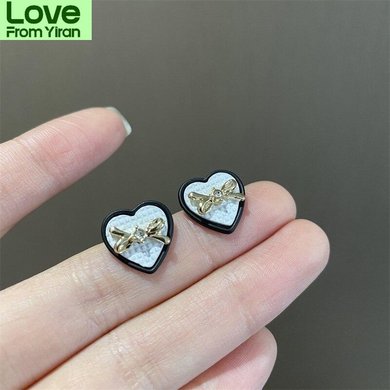 Simple Fashion Bowknot Heart Metallic Stud Earrings  New Korean Style Earings Jewelry Wholesale