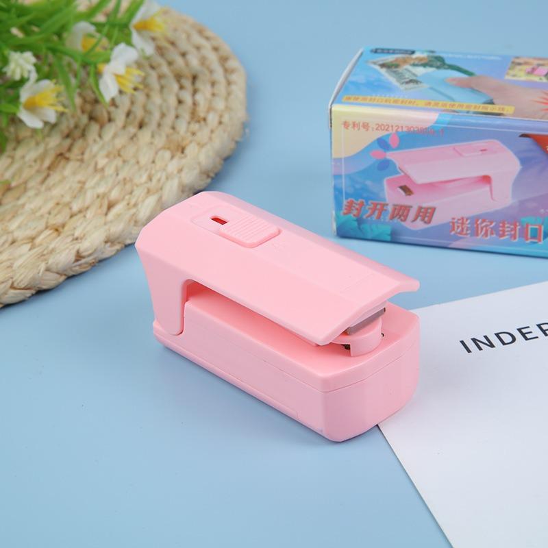 Mini zahřívací stroj na uzavírání sáčků Sáčky na zatavování tepelných plastových sáčků Uzavření přenosných sáčků Balení potravin Tepelné zatavování