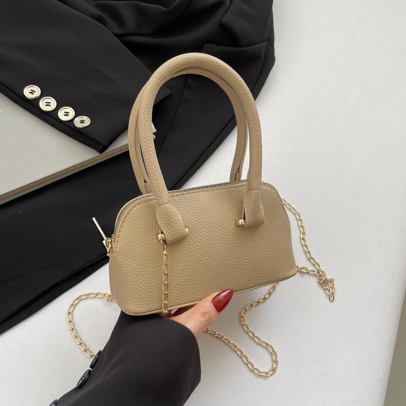 

Мини-сумка женская летняя 2025 новая корейская нишевая высококачественная одноплечевая косая переносная розовая сумка-ракушка хаки