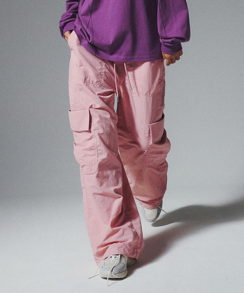 TRAVEL Stitch Parachute Pants Coral Pink