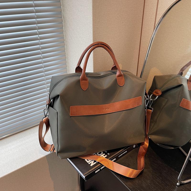 Large-capacity travel bag Women's portable travel light bag Sports fitness bag Men's short-distance storage luggage bag