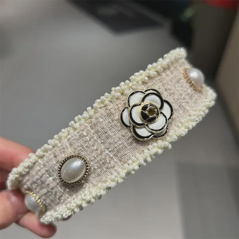 Elegant Baroque Pearl Headband with Camellia Inlay for Women