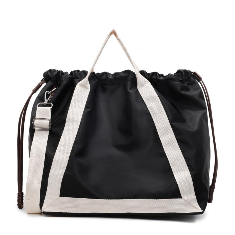 Lazy wind large-capacity bag women's spring and autumn fashion versatile handbag pumping mouth commuter bag shoulder messenger bag