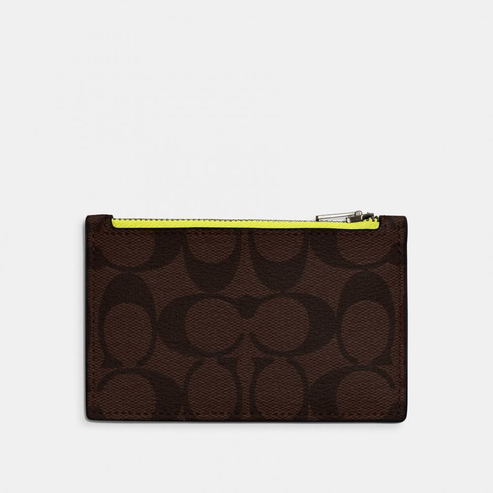 

Чехол для визиток Coach из фирменной канвы на молнии