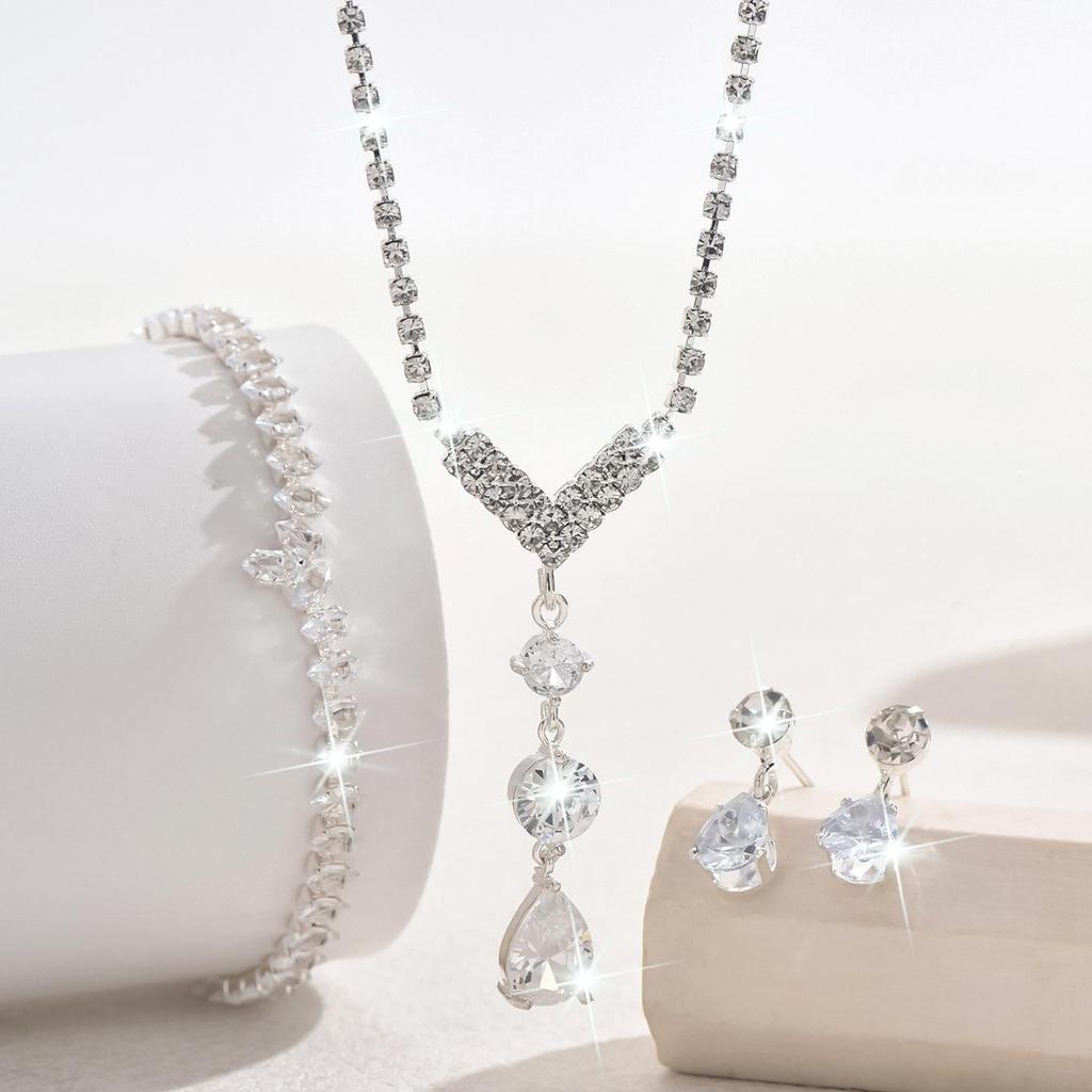 Elegant Zirconia Water Drop Jewelry Set: Pendant Earrings, Necklace, and Bracelet for Women