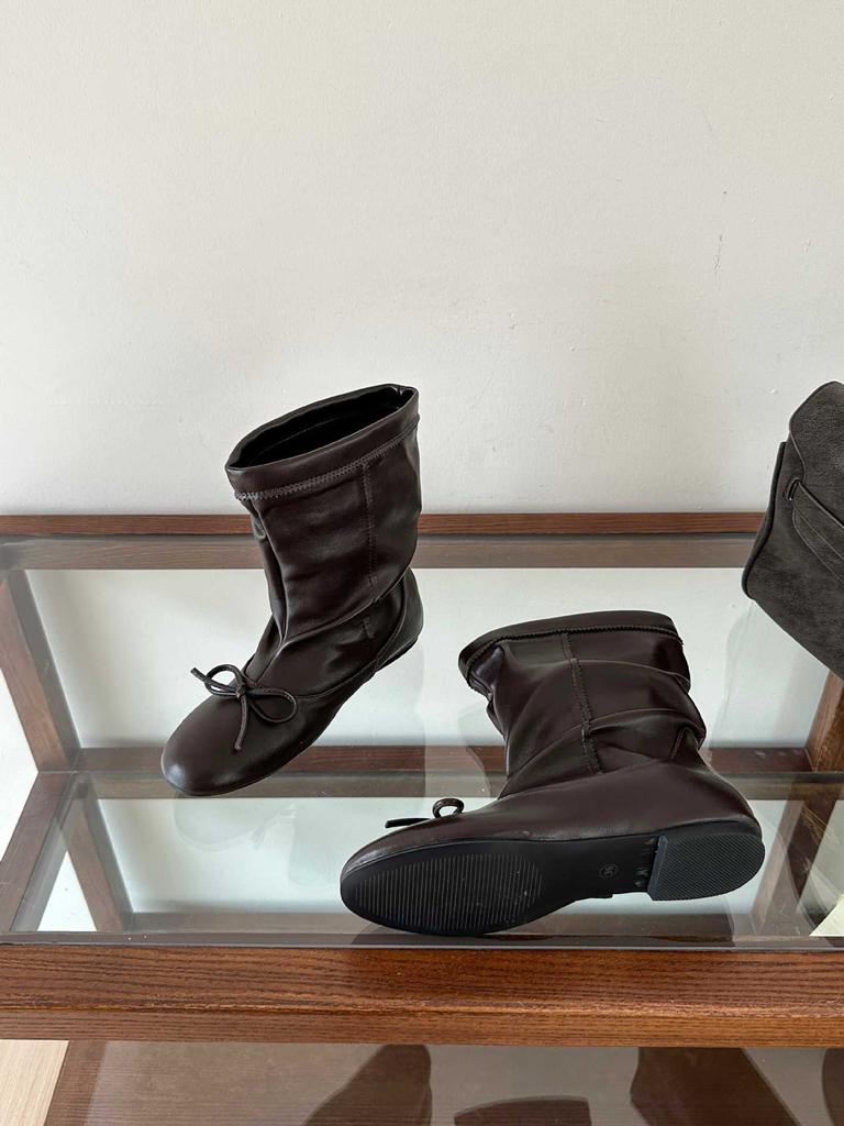 [] Autumn new inner height increase bow elastic boots round head medium boots women's boots