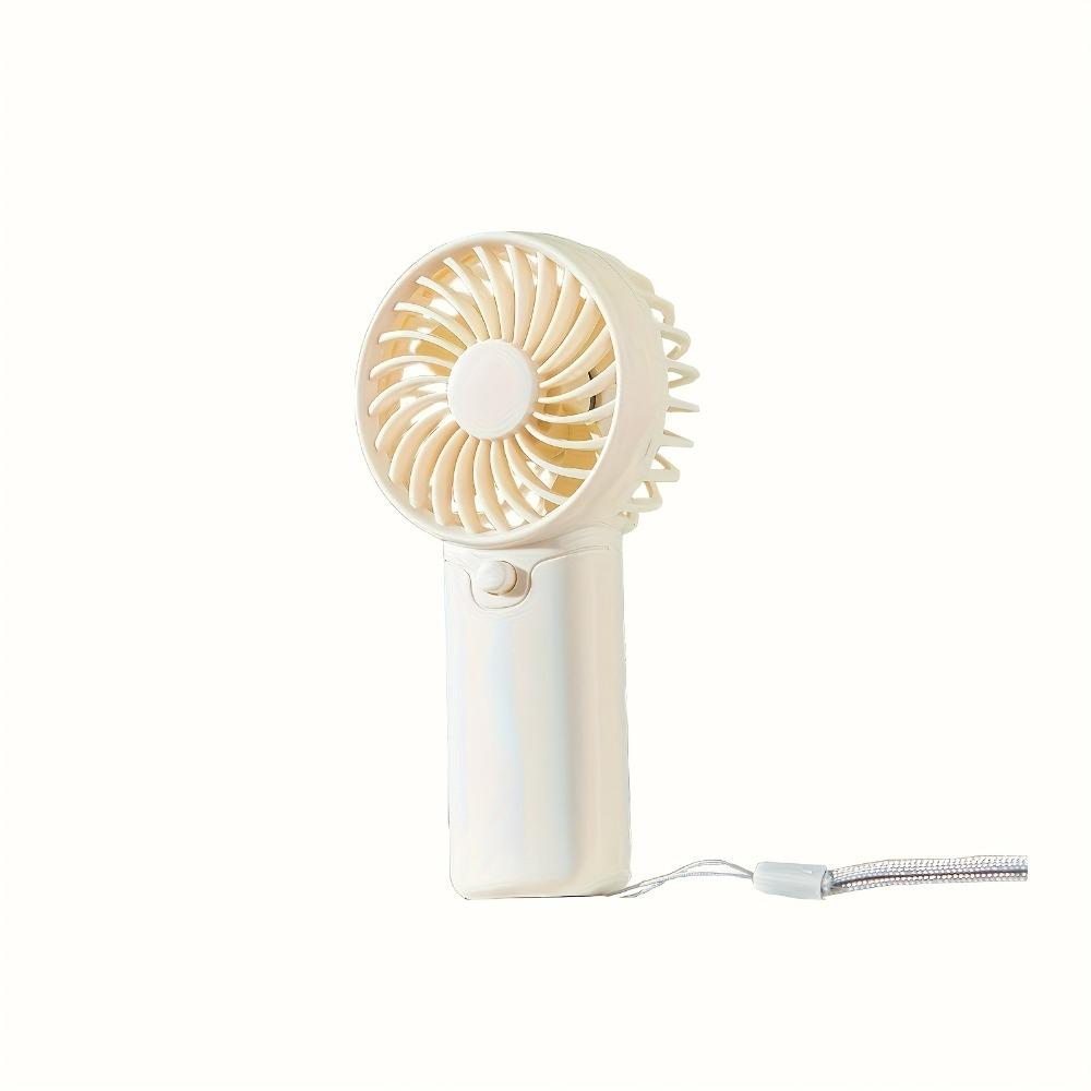Compact Handheld Fan - Portable, Battery-Powered Personal Cooling Device for Travel & Outdoor Use, AAA Batteries Not Included