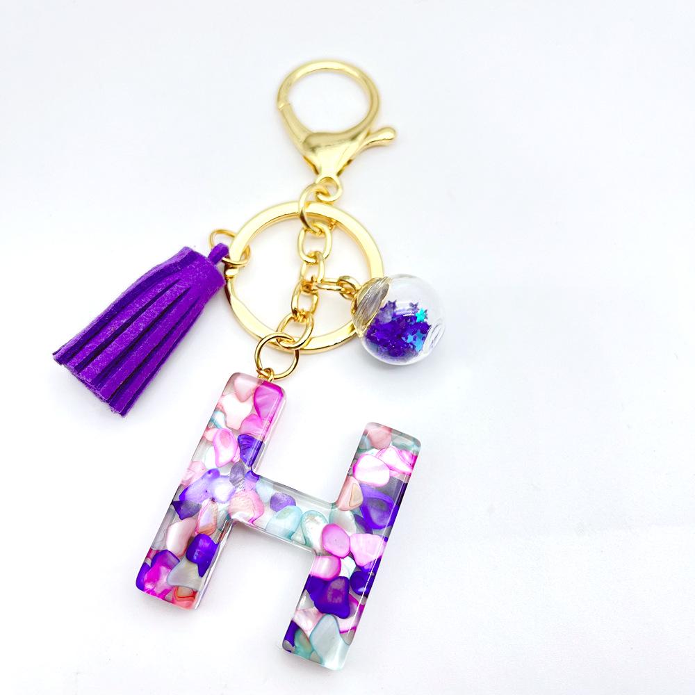 Breloc inițial englezesc de vânzare la cald european și american cu accesoriu cu ciucuri violet