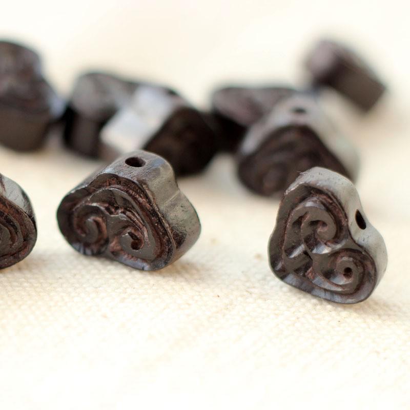 

Handmade Ebony Wood Ruyi Carving Jewelry Accessories: Loose Beads with Auspicious Cloud Design.