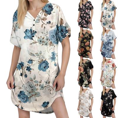 Damen Freizeitkleid mit Print, Knopfleiste am Ausschnitt, kurzen Raglanärmeln und kurzer Länge